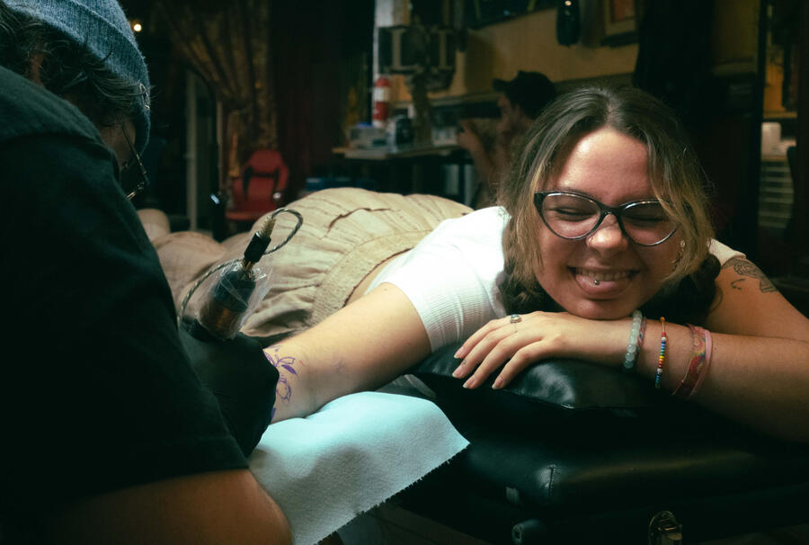 Cathy getting her tattoo